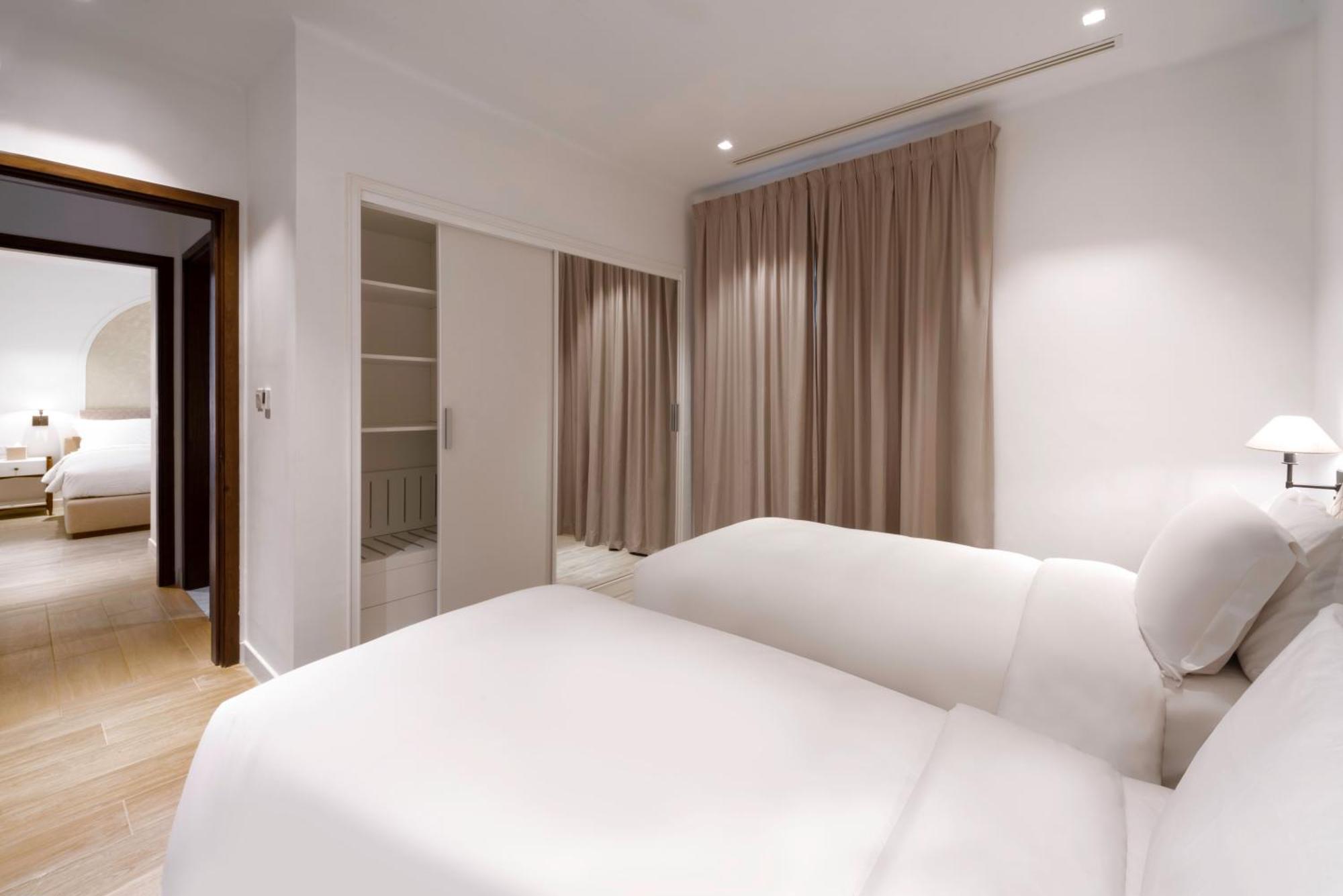 Mina Hotel And Residences By The Torch Ad-Dauha Zewnętrze zdjęcie A bedroom at the hotel