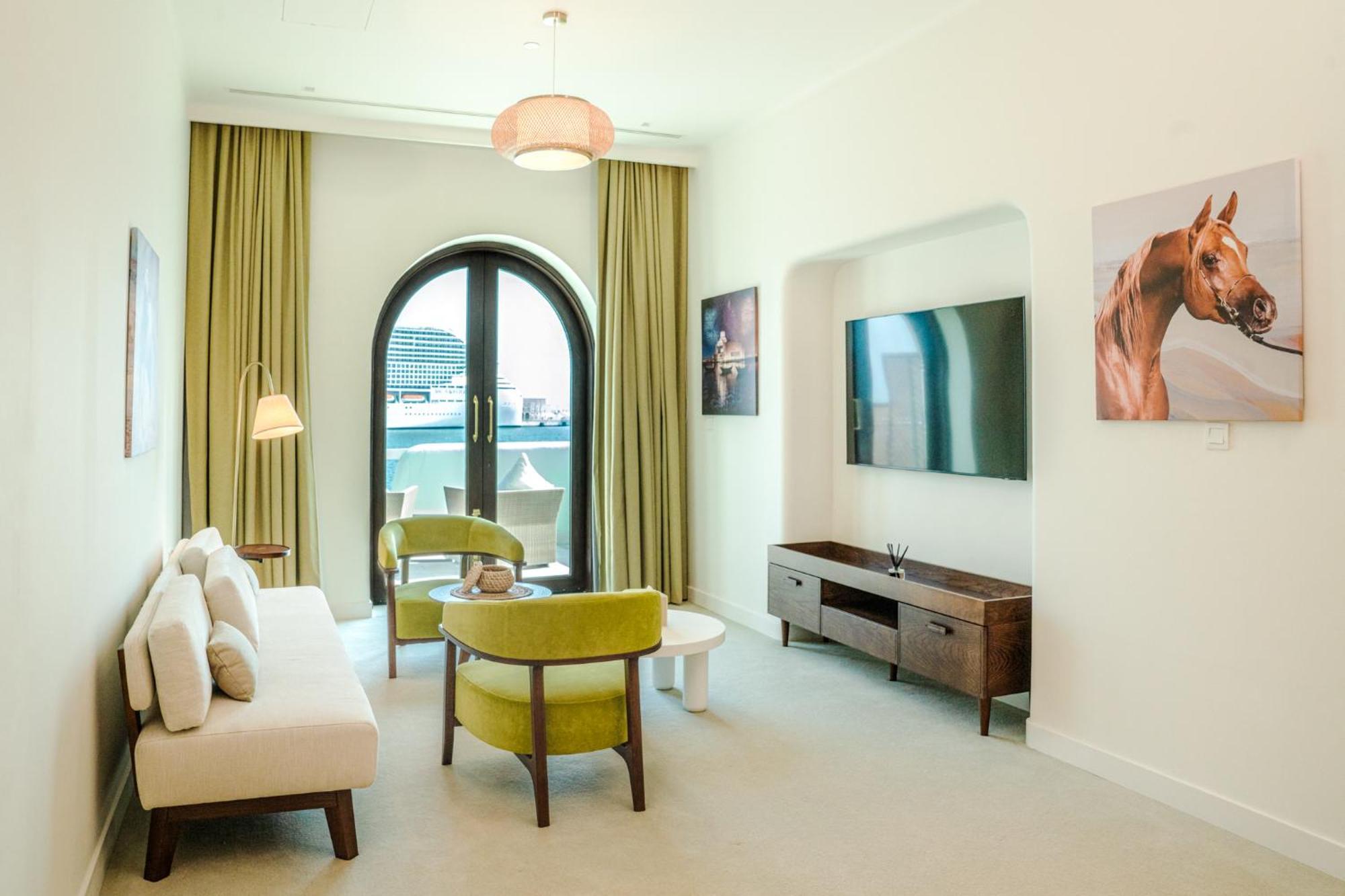 Mina Hotel And Residences By The Torch Ad-Dauha Zewnętrze zdjęcie A living room at the hotel